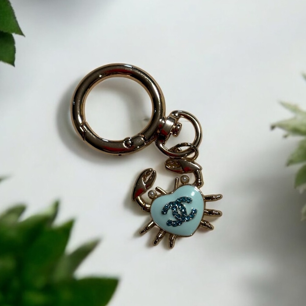 CC crab stamped zipper pull